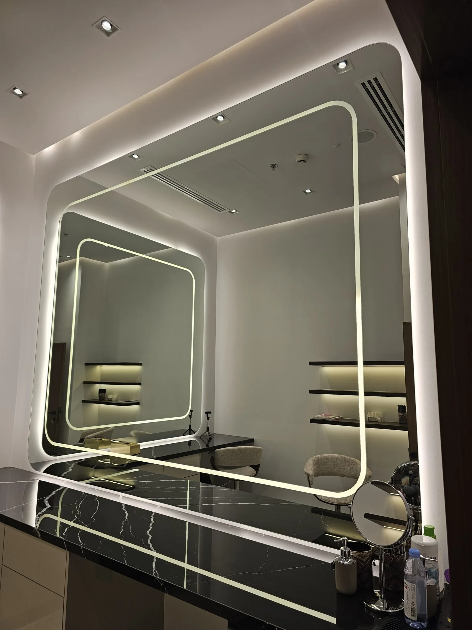 Custom illuminated feature mirror completed by Crystal Vista