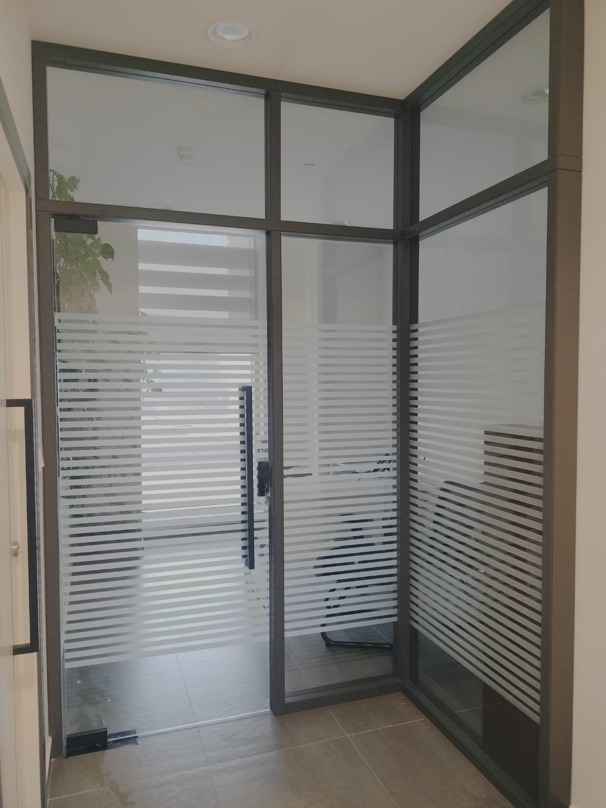 Frosted glass office partition completed by Crystal Vista